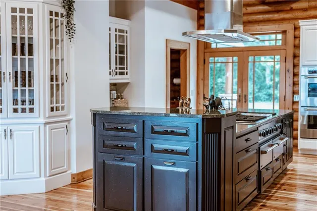 a view of staircase with a rug