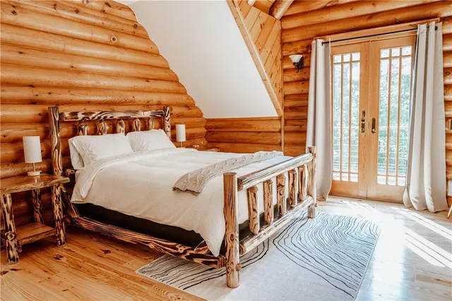 a bathroom with a sink a mirror and a shower curtain