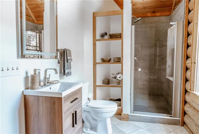 a picture of a bathroom with a picture of a wall