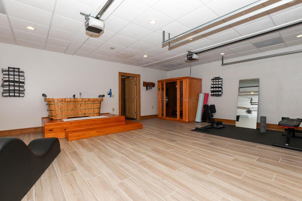 2154 Apple Pie Ridge Road Alto, GA 30510 - Photo 67 of 81 a view of a hall with wooden floor and furniture