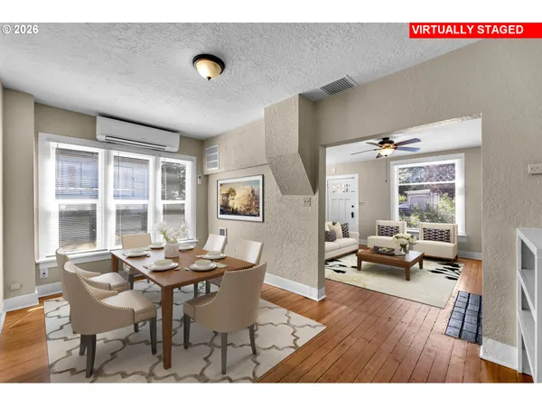 a workspace with furniture and wooden floor