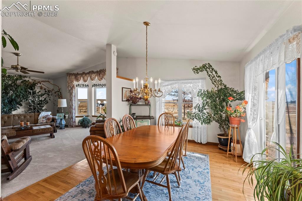 9330 Berridge Road Calhan, CO 80808 - Photo 7 of 50 a view of a dining room with furniture window and outside view
