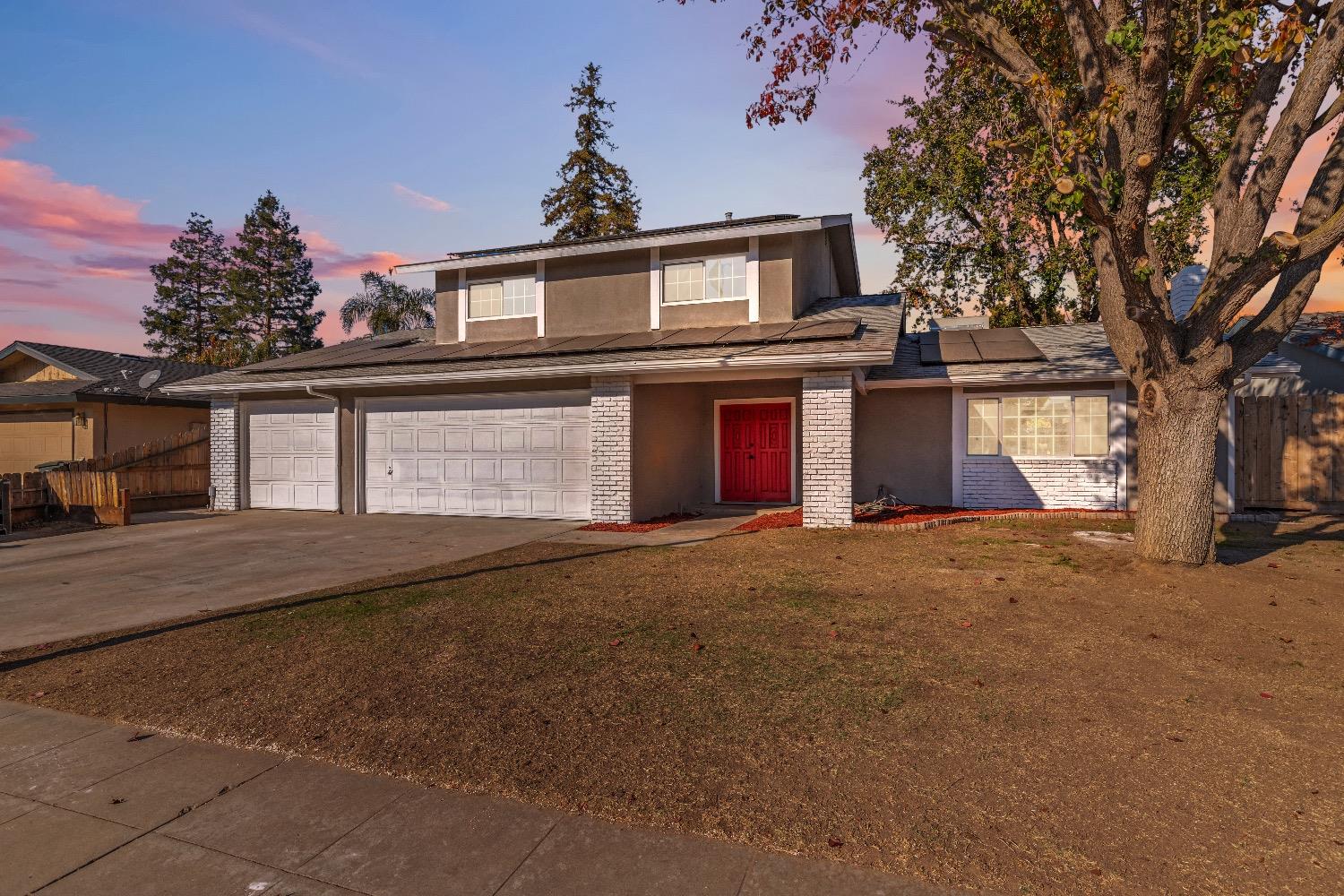 front view of a house with a street