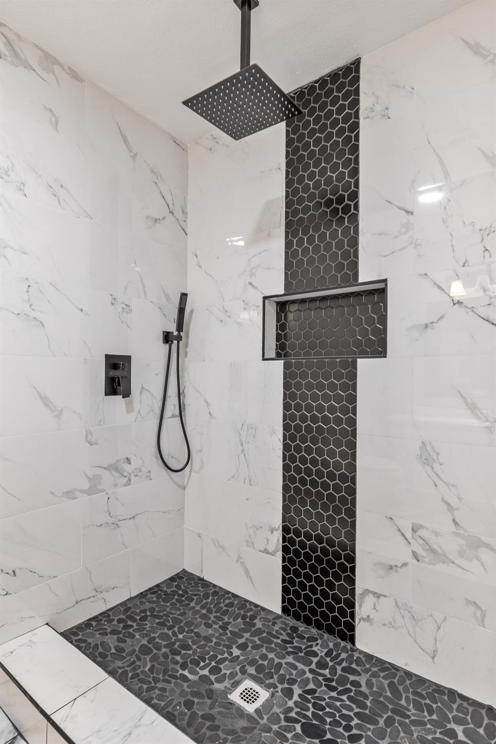 1053 Menlo Avenue Clovis, CA 93612 - Photo 20 of 41 a bathroom with a shower