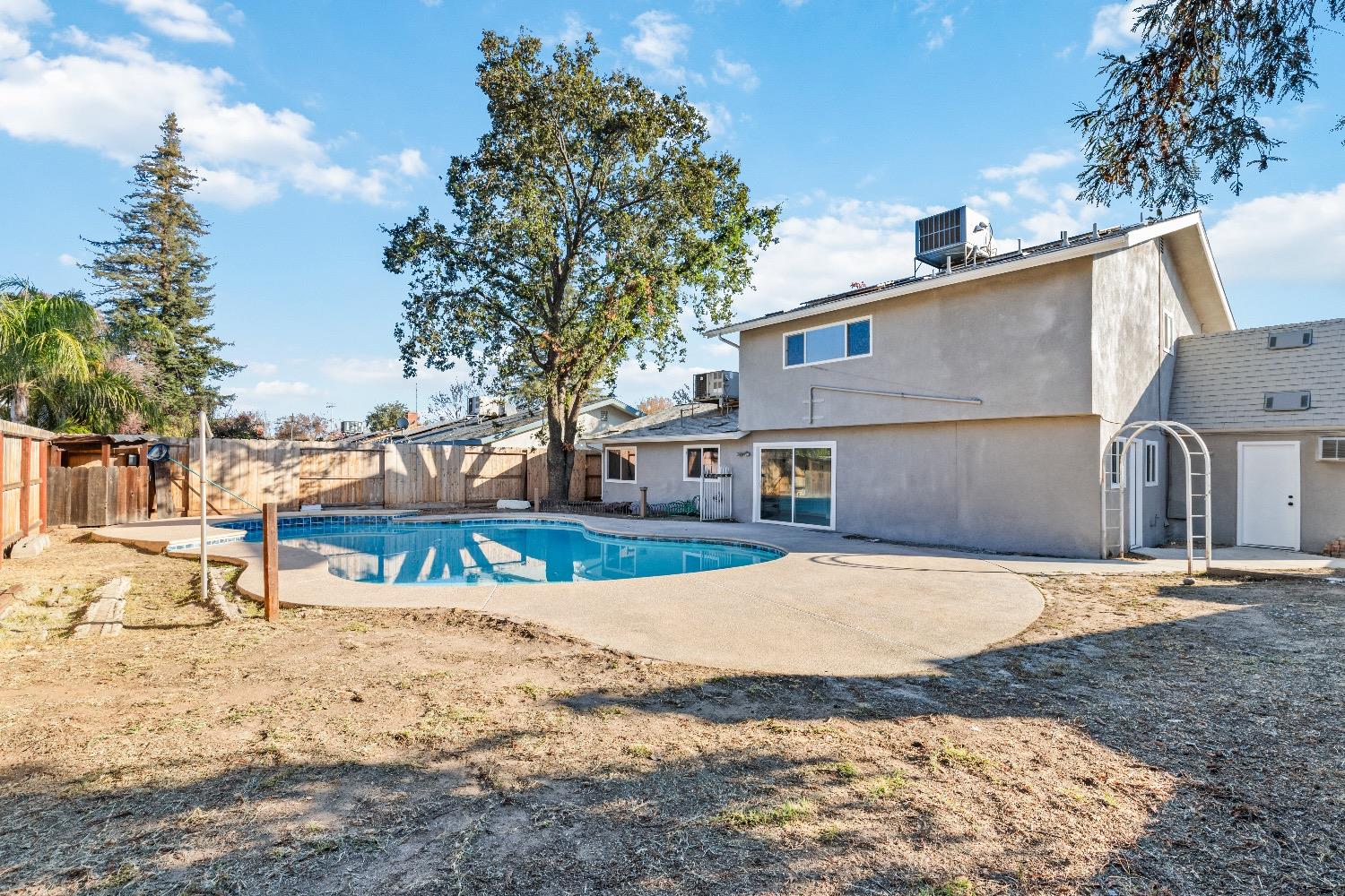 1053 Menlo Avenue Clovis, CA 93612 - Photo 33 of 41 a view of a house with snow on the road