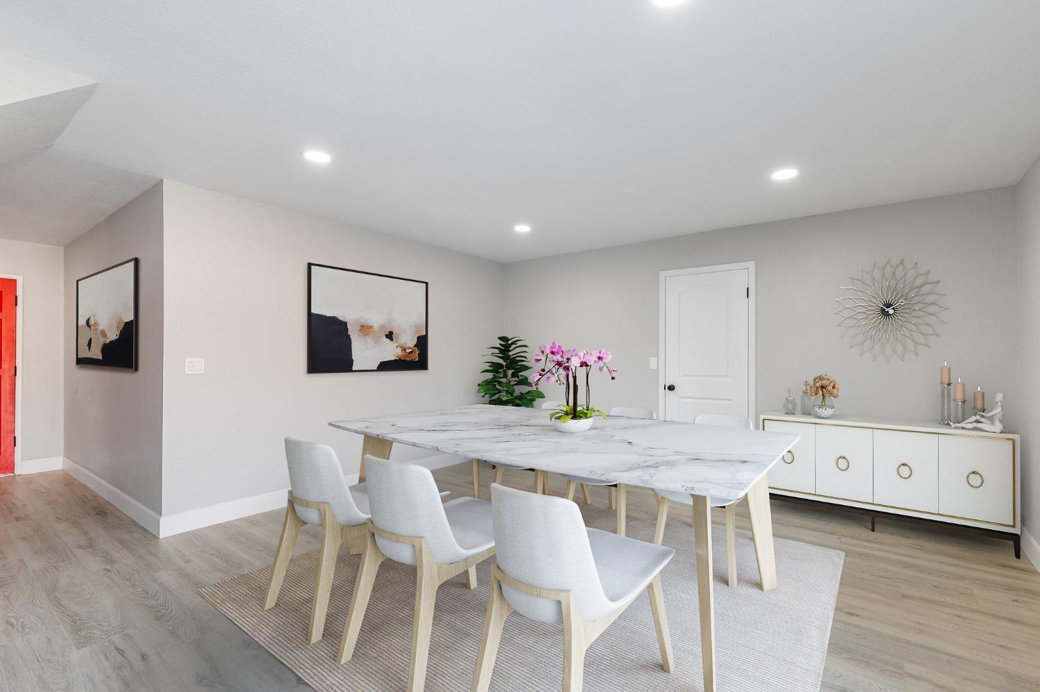 1053 Menlo Avenue Clovis, CA 93612 - Photo 10 of 41 a dining room with furniture and wooden floor