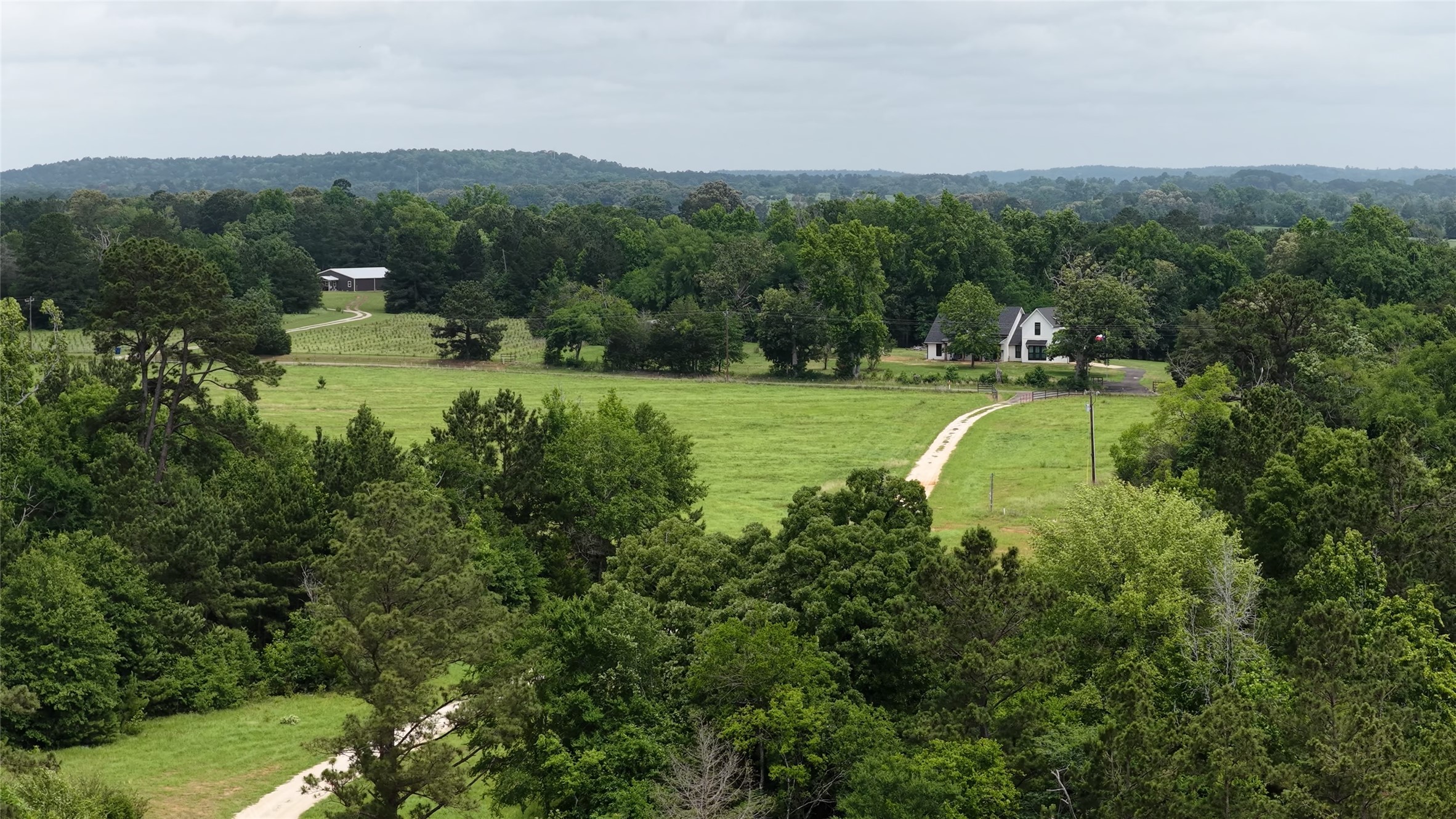 447 County Road 2211 Rusk, TX 75785 - Photo 6 of 50 a view of a golf course with a lake view
