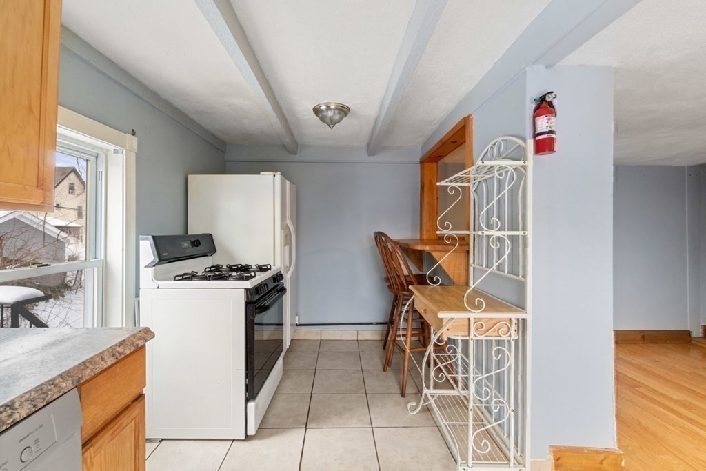 48 Cedar Street Boston, MA 02126 - Photo 29 of 32 a storage room with washer and dryer