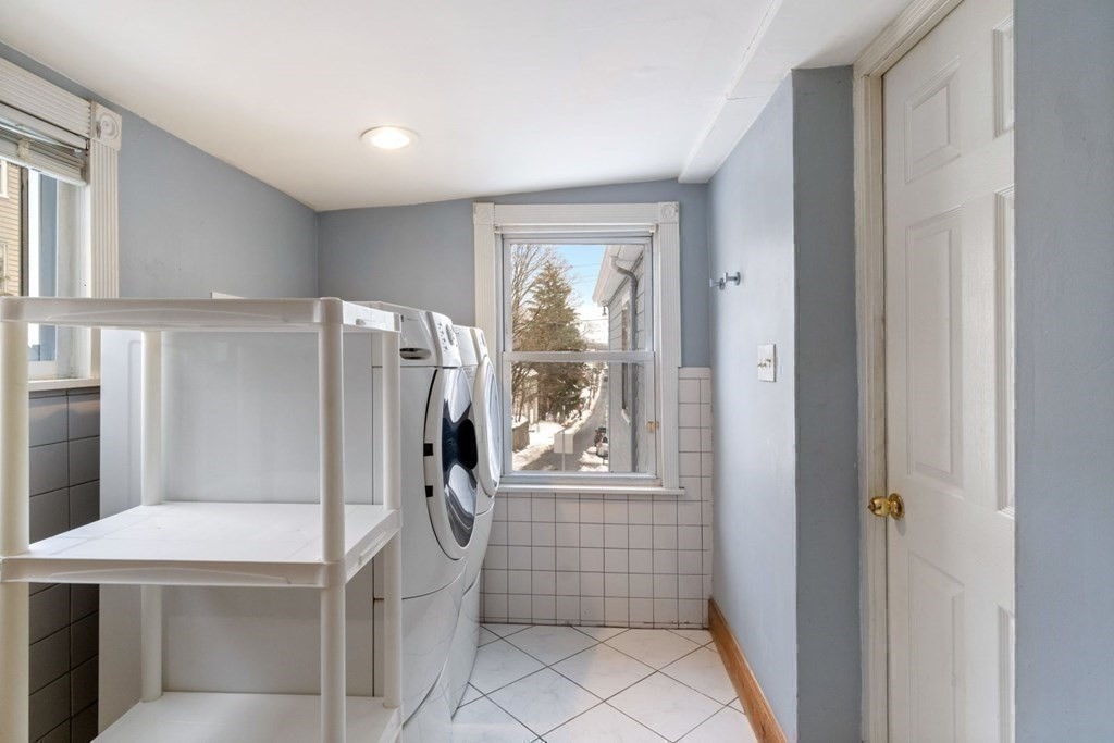 48 Cedar Street Boston, MA 02126 - Photo 32 of 32 a bathroom with a shower