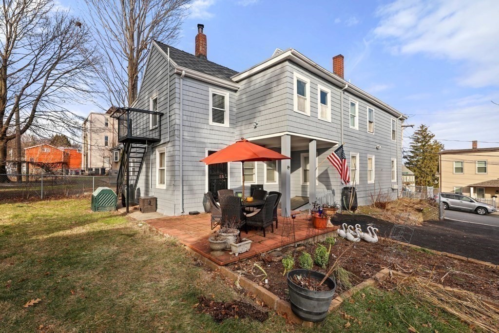 48 Cedar Street Boston, MA 02126 - Photo 5 of 32 a front view of a house with patio