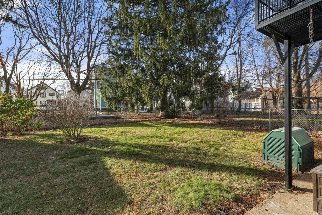 48 Cedar Street Boston, MA 02126 - Photo 8 of 32 a view of swimming pool with a yard
