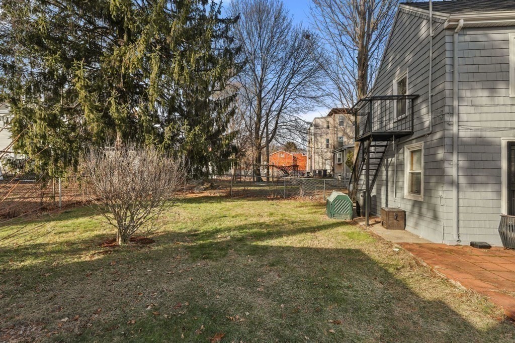 48 Cedar Street Boston, MA 02126 - Photo 10 of 32 a view of yard with swimming pool and sitting area