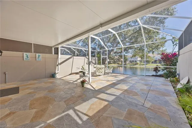 a view of an empty room with a garage