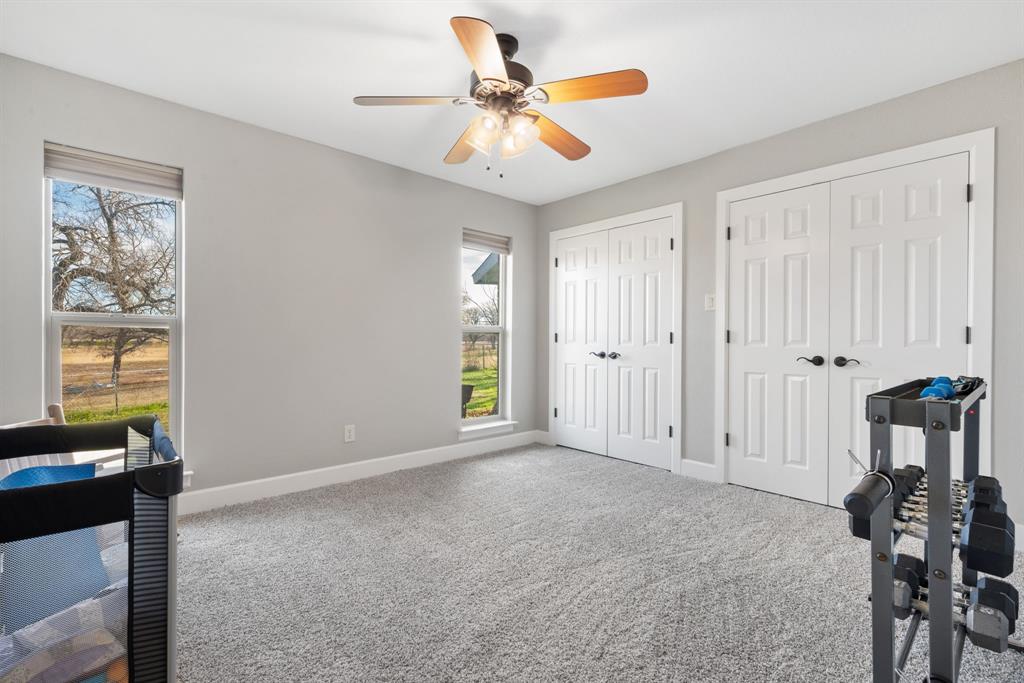 1407 Withers Road Mineral Wells, TX 76067 - Photo 22 of 38 a view of an empty room with a window