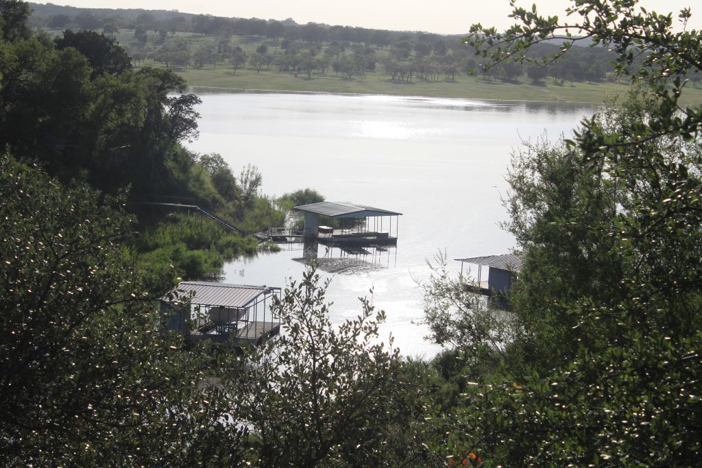 5255 Lookout Ridge Drive Marble Falls, TX 78654 - Photo 2 of 40 Lake Travis view out back of house; access at rear to Lake for fishing, swimming, boating, kayaking