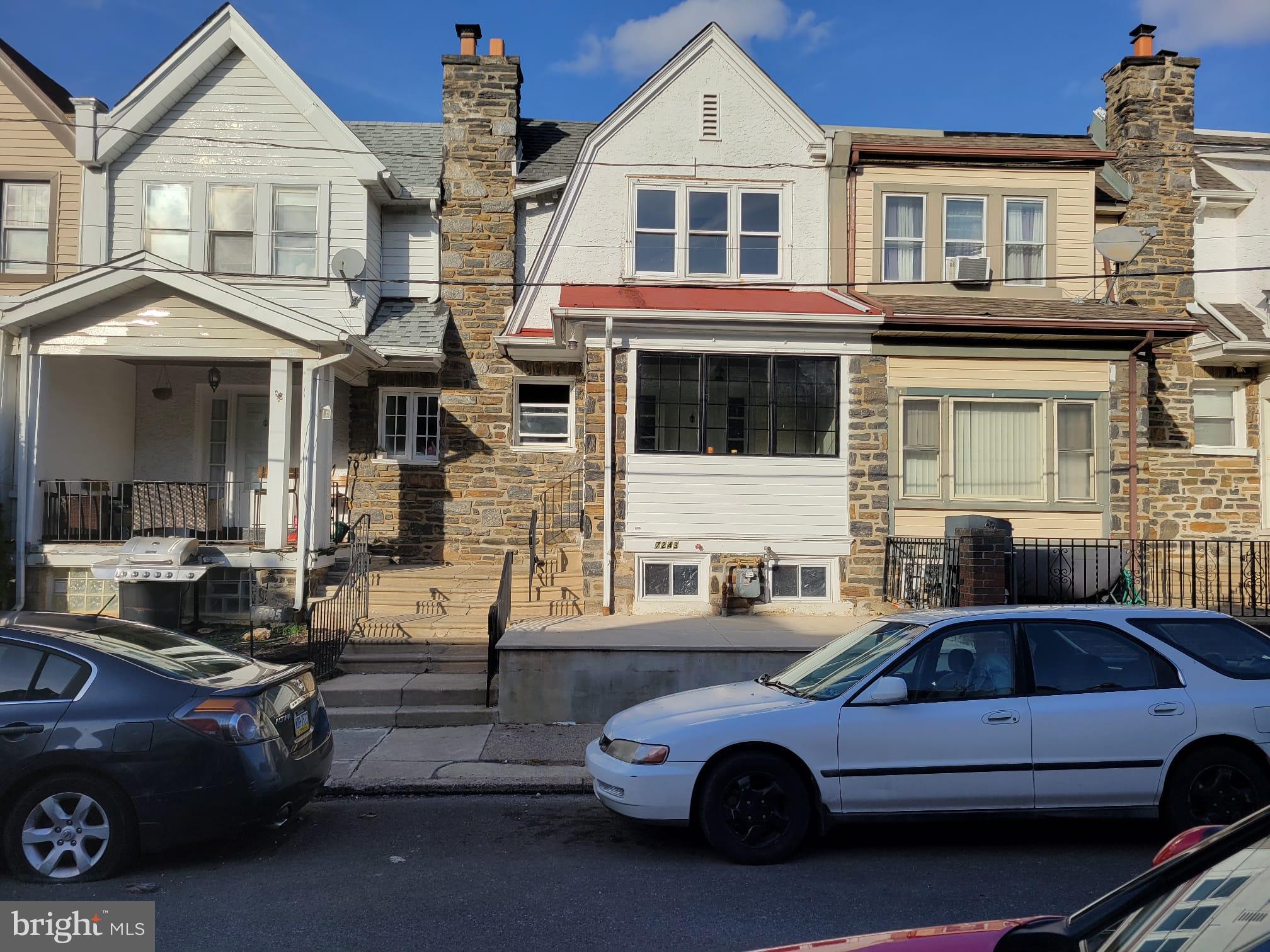 7243 Calvin Road Upper Darby, PA 19082 - Photo 1 of 29 a front view of a house with parking space