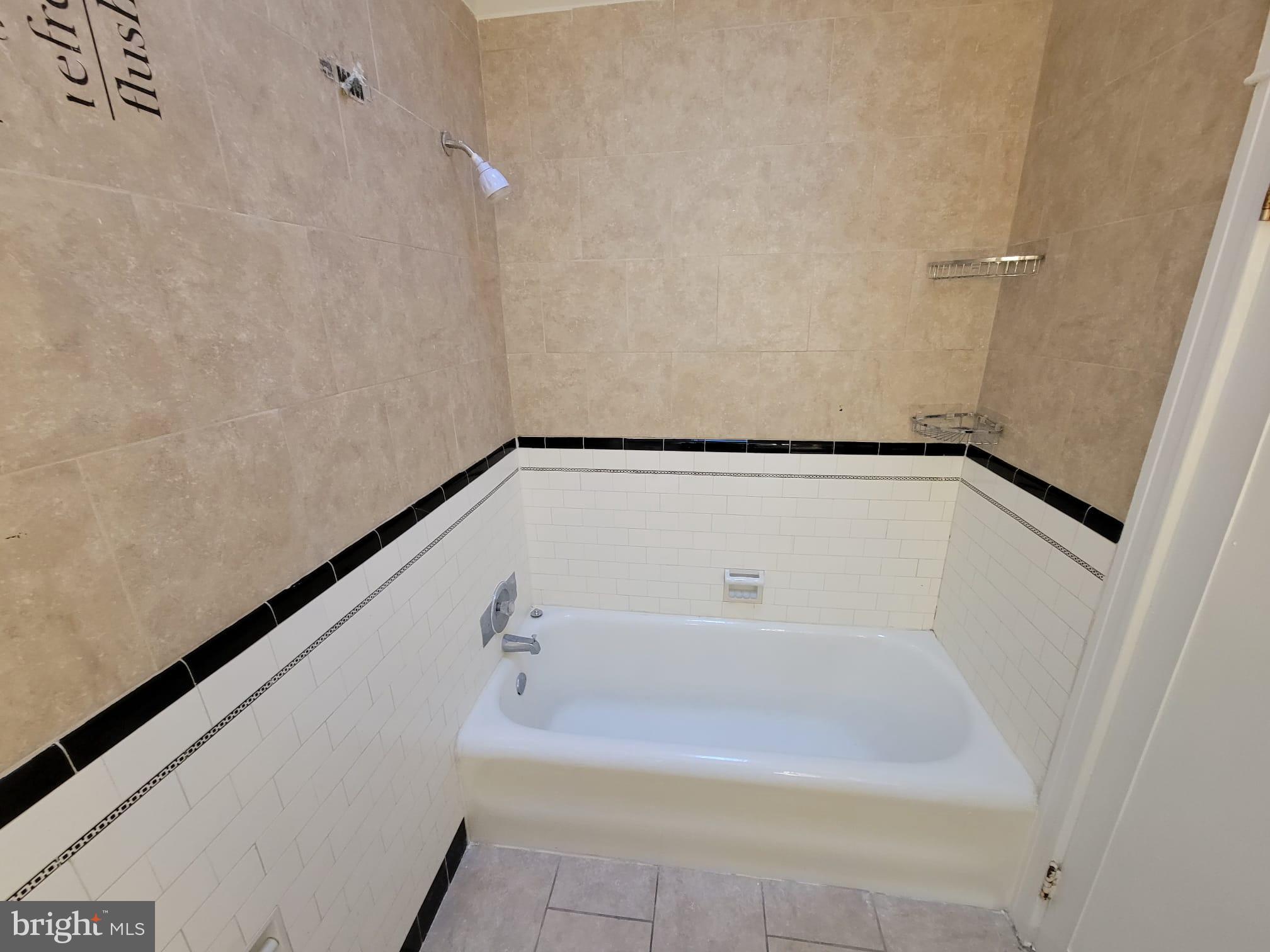 7243 Calvin Road Upper Darby, PA 19082 - Photo 24 of 29 a bathroom with a bathtub