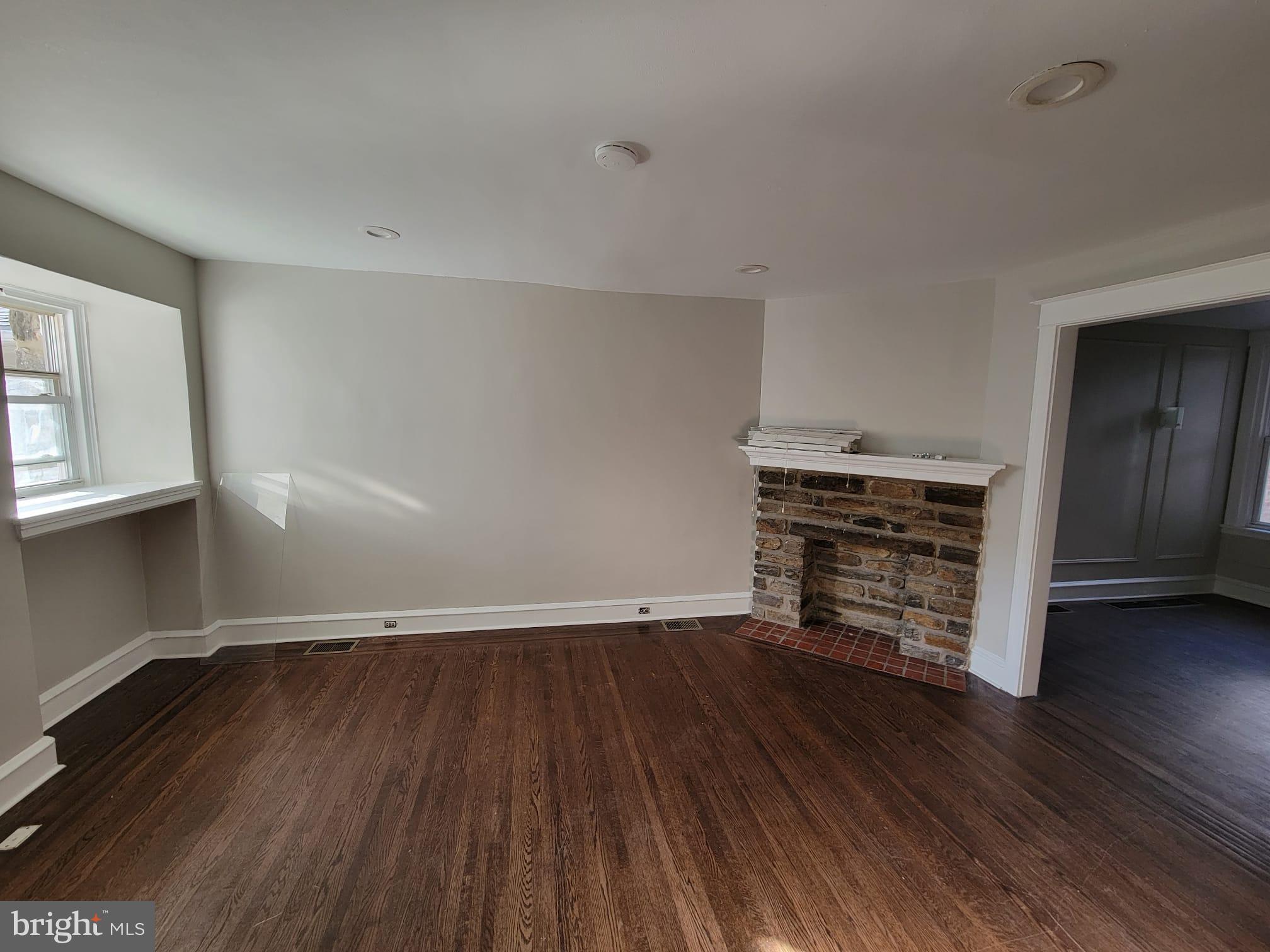 7243 Calvin Road Upper Darby, PA 19082 - Photo 6 of 29 an empty room with wooden floor closet and windows
