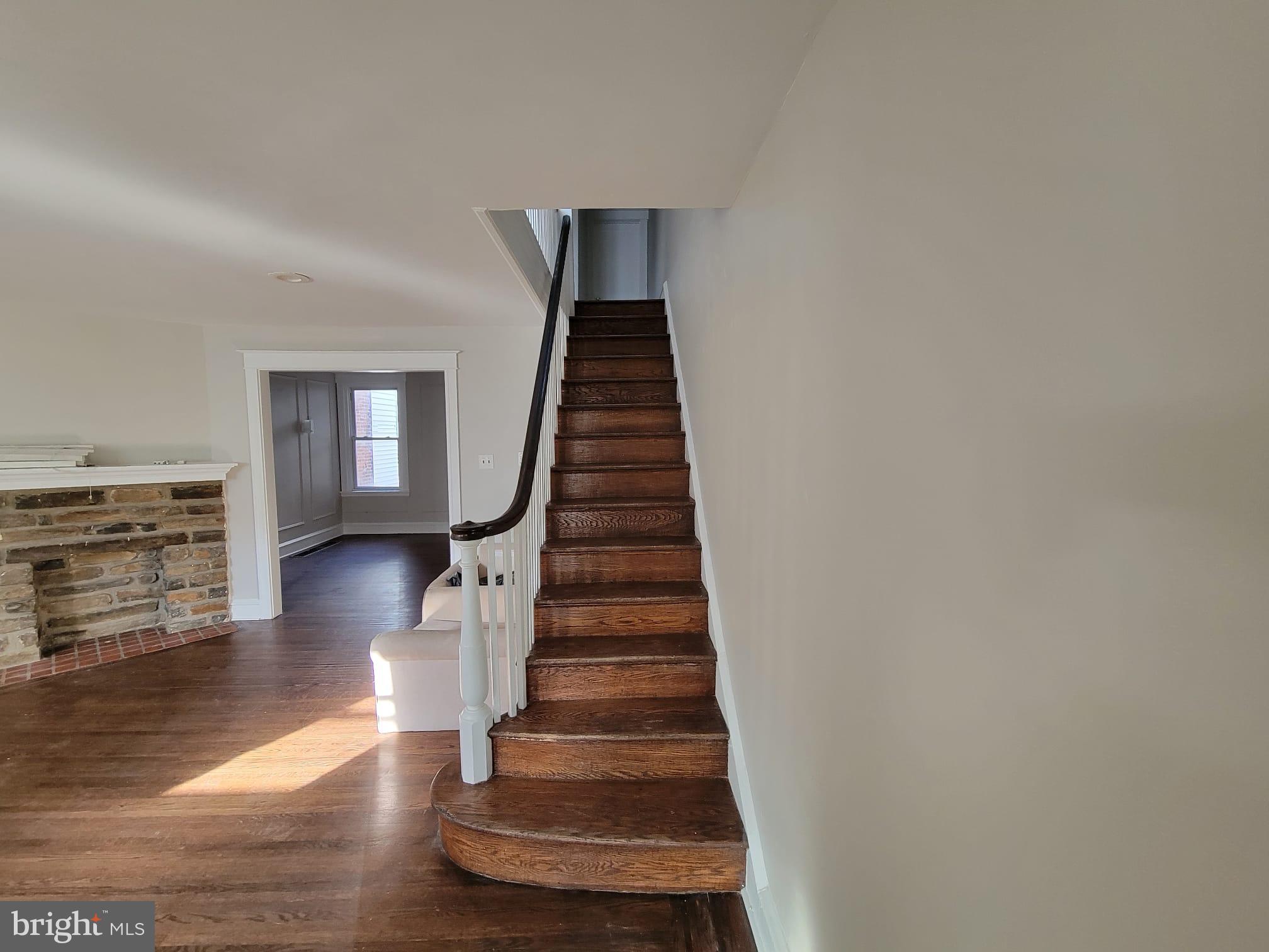 7243 Calvin Road Upper Darby, PA 19082 - Photo 7 of 29 a view of entryway and hall with wooden floor
