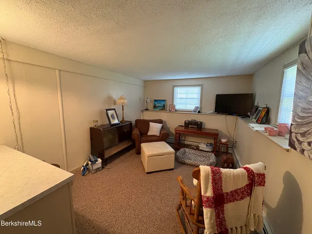 a view of a patio on the roof deck