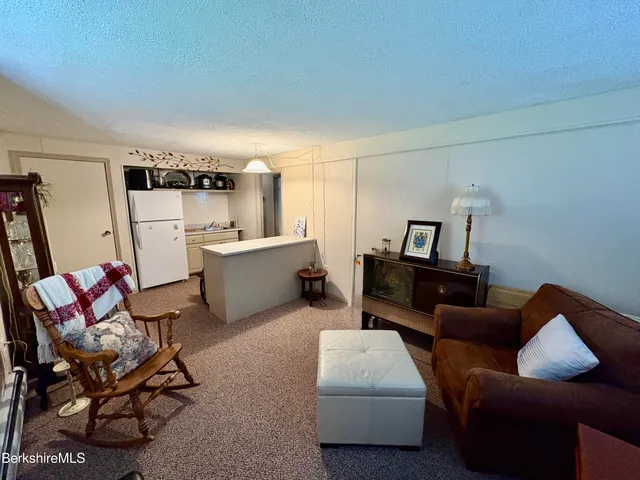 a outdoor living space with furniture and mountain view