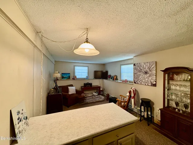 a view of a patio on the roof deck