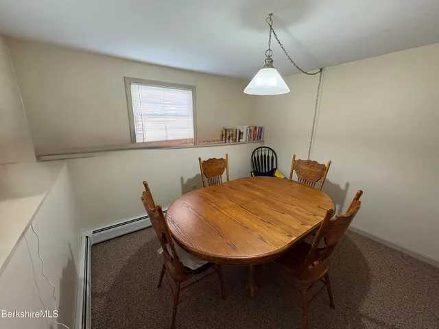 a view of a golf course with trees