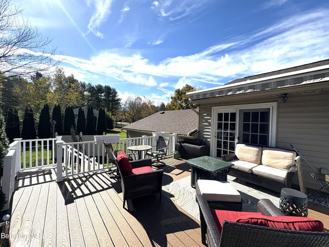 a front view of a house with a outdoor space