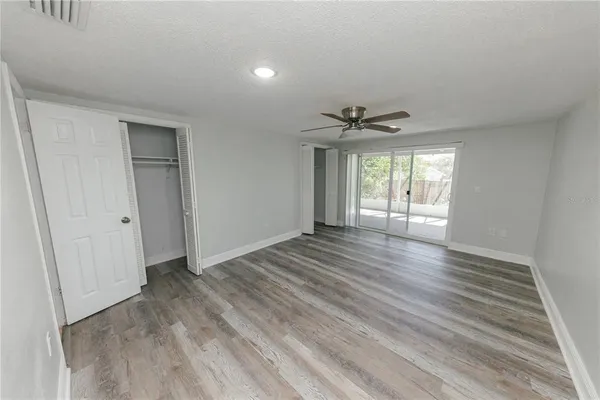 a view of entryway with wooden floor