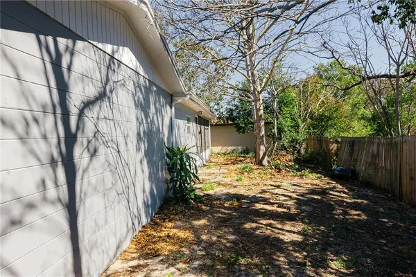 a view of yard with trees