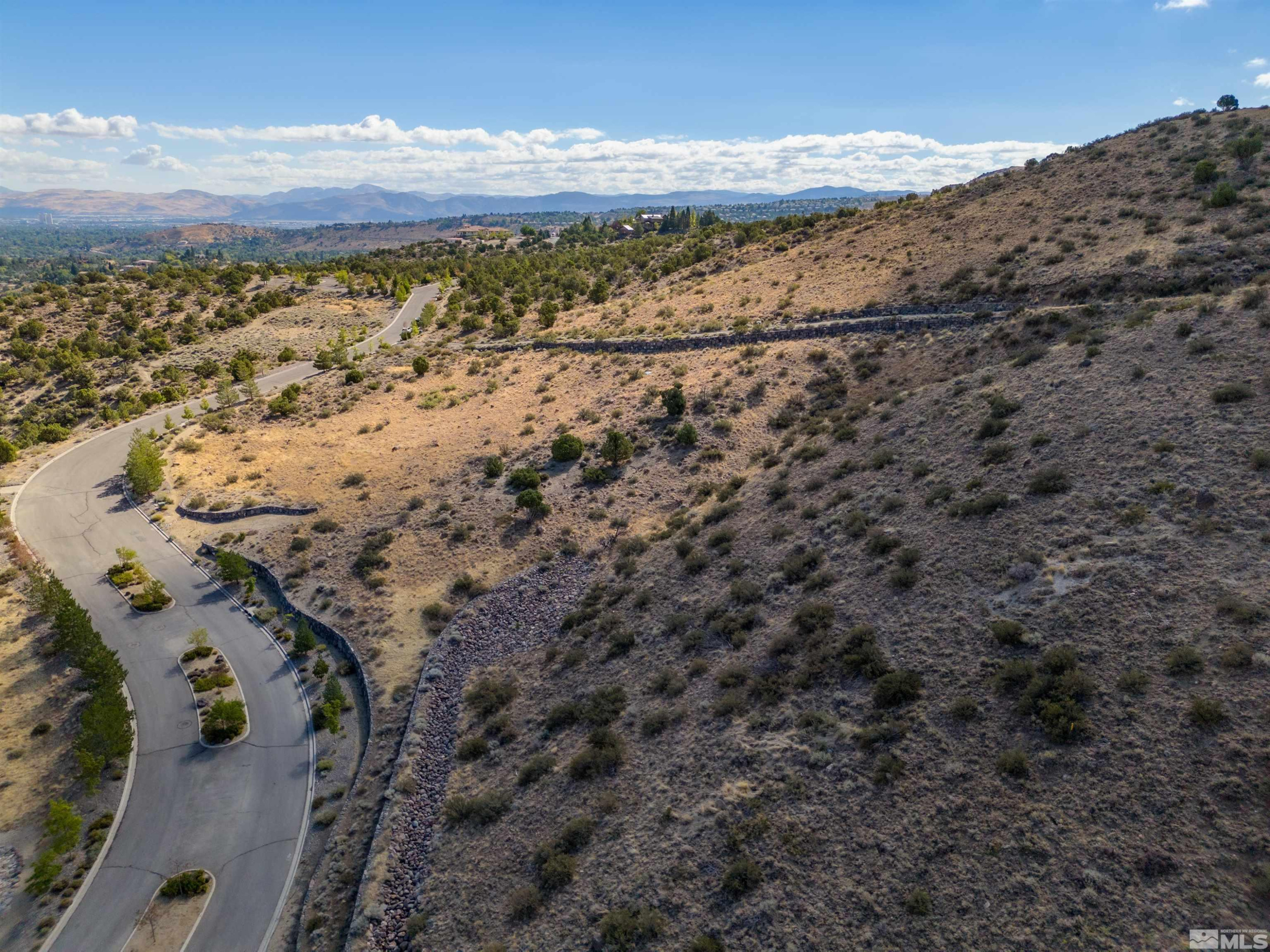 4825 Woodchuck Circle, Unit 17 Reno, NV 89519 - Photo 4 of 6 a view of mountain with wooden floor