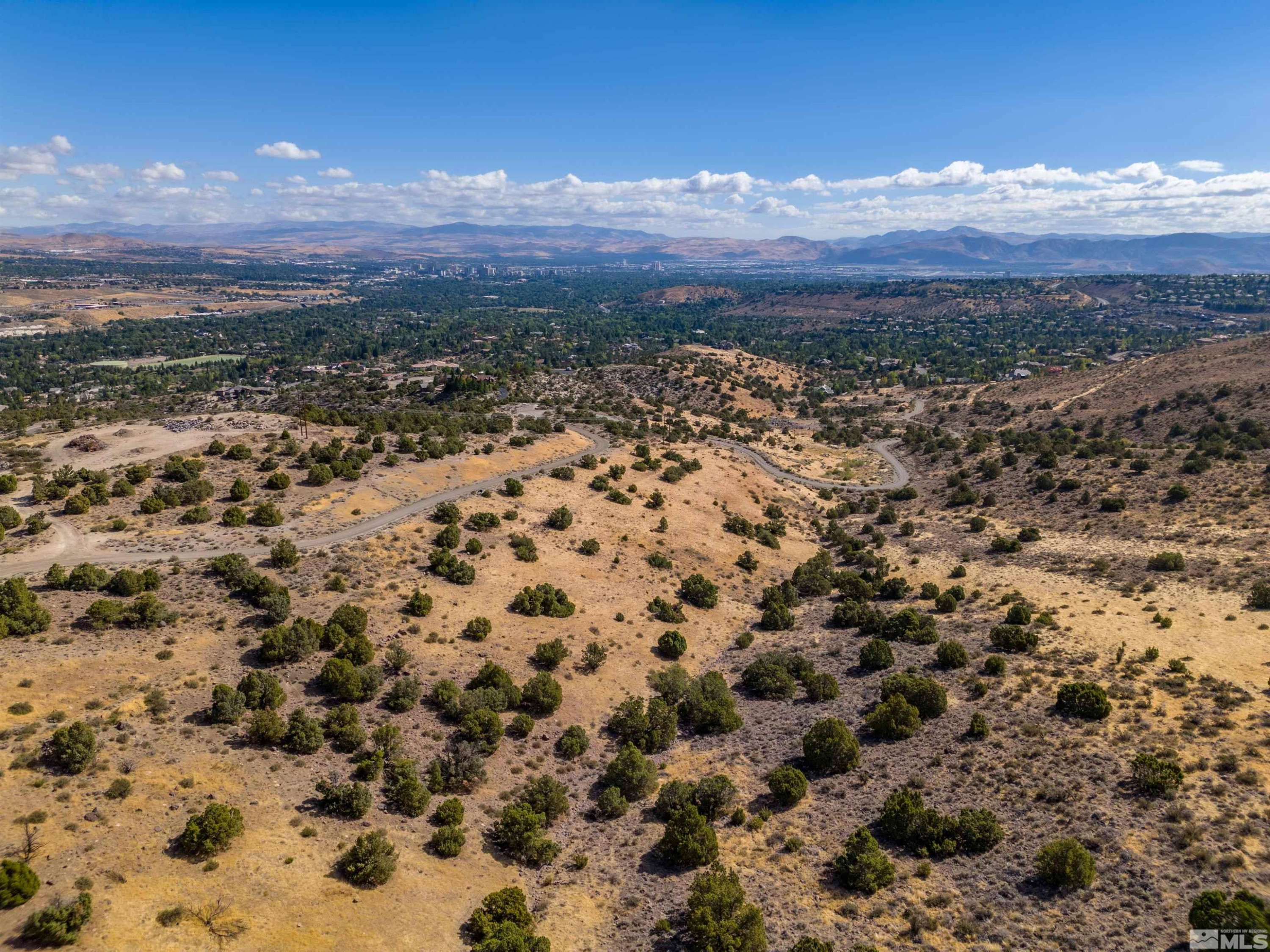 4825 Woodchuck Circle, Unit 17 Reno, NV 89519 - Photo 5 of 6 a view of a city with sunset view