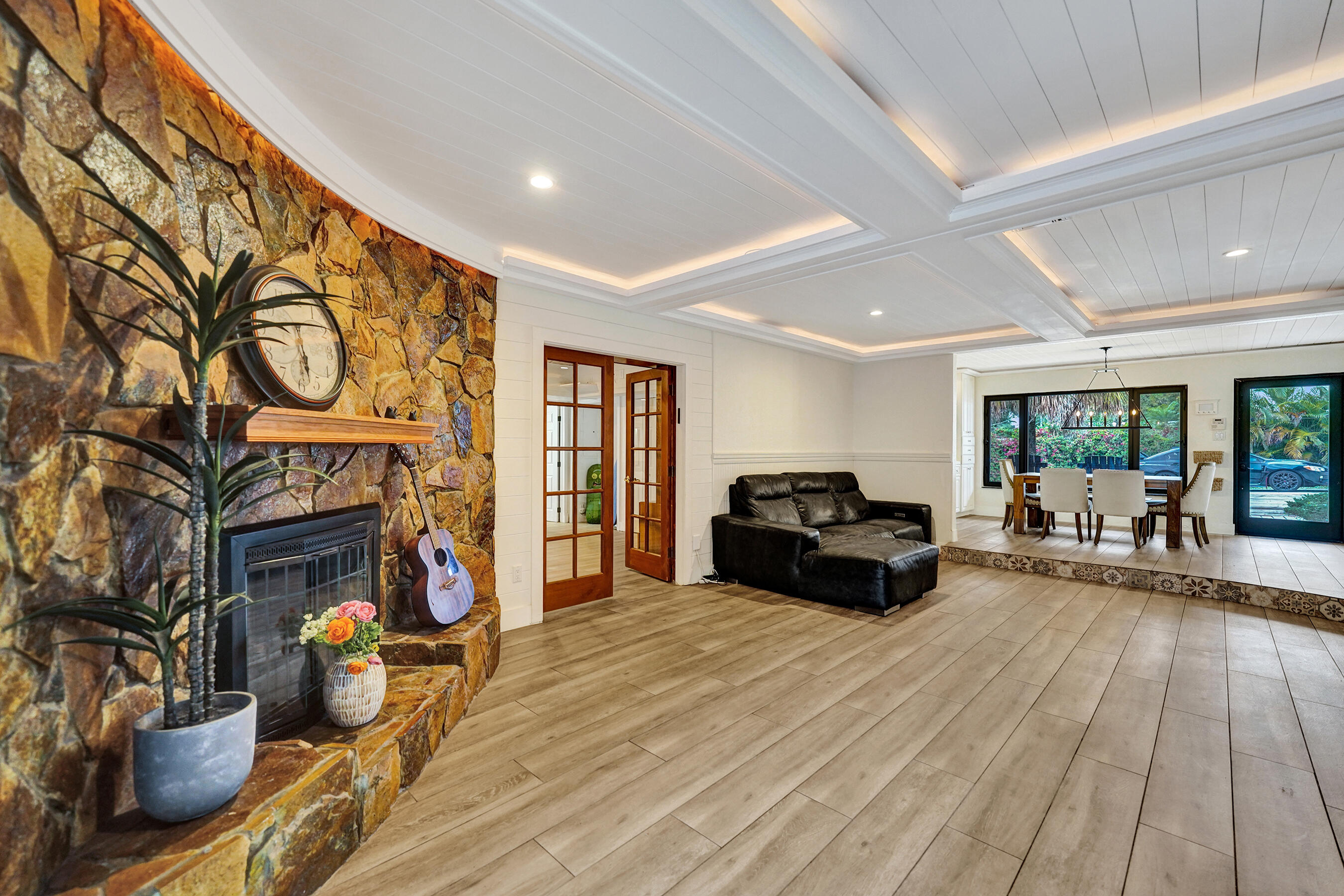5612 Harding Street Hollywood, FL 33021 - Photo 18 of 52 a living room with furniture and a fireplace