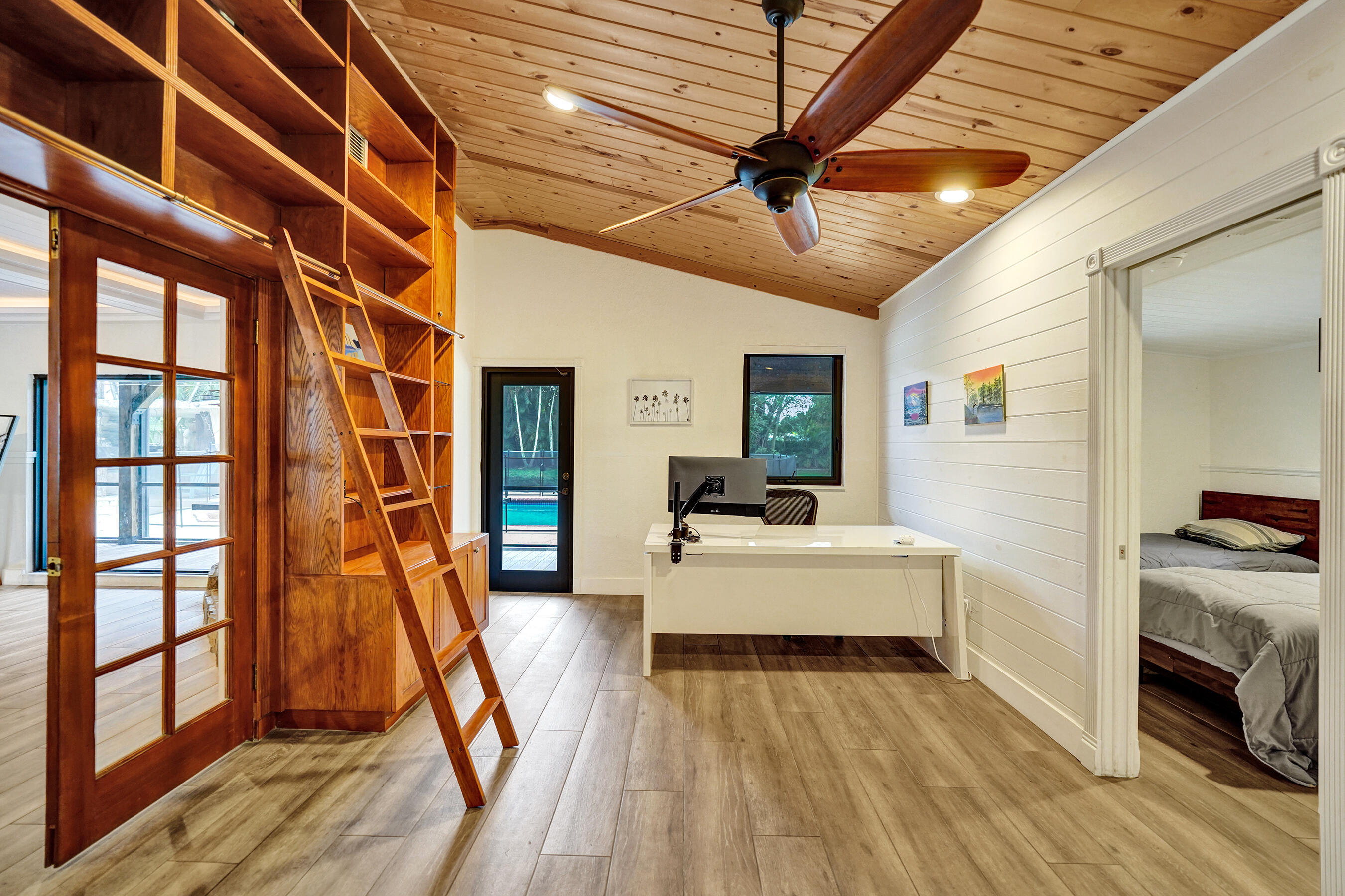 5612 Harding Street Hollywood, FL 33021 - Photo 19 of 52 a view of a livingroom with furniture and a ceiling fan