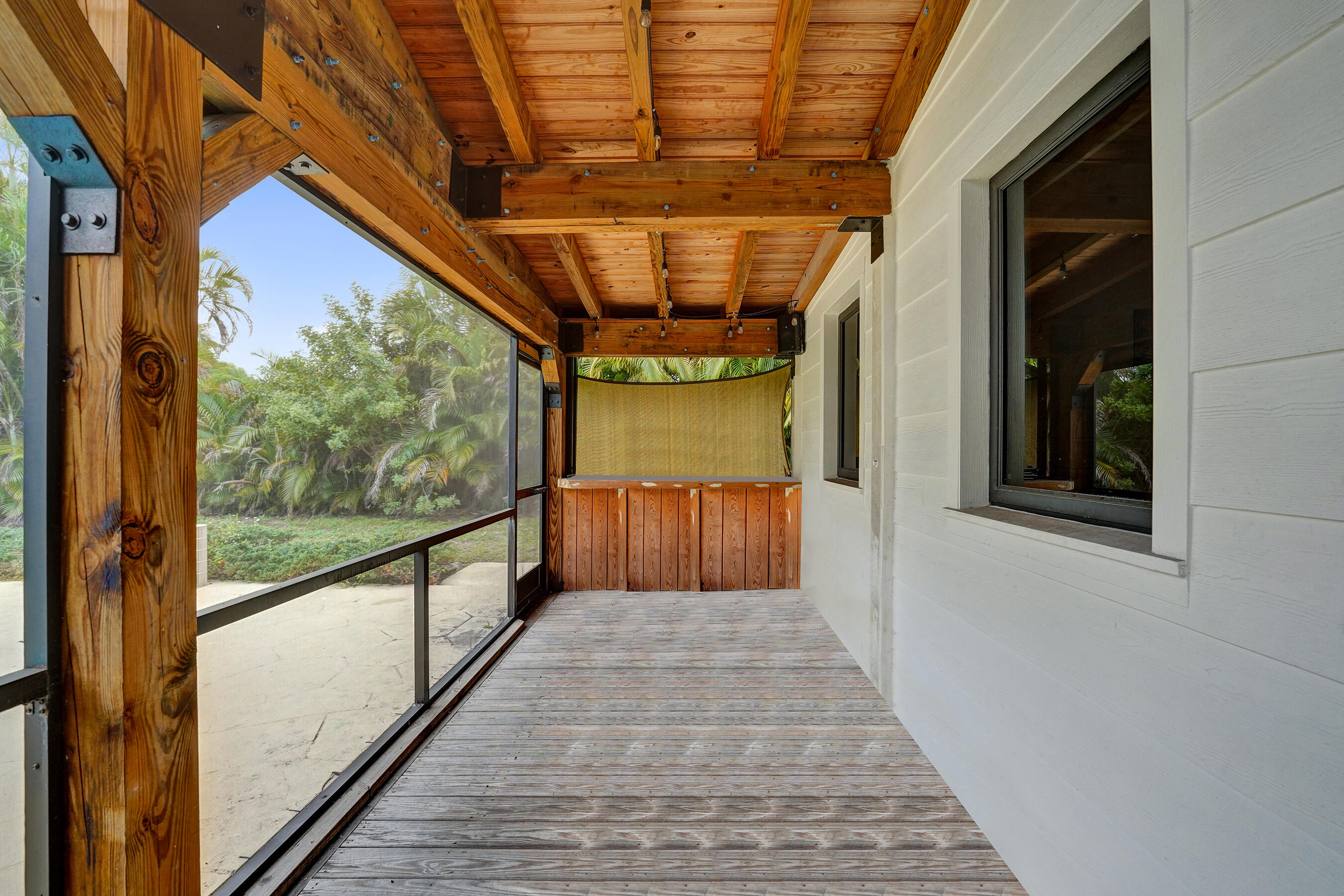 5612 Harding Street Hollywood, FL 33021 - Photo 20 of 52 a view of a porch and garden