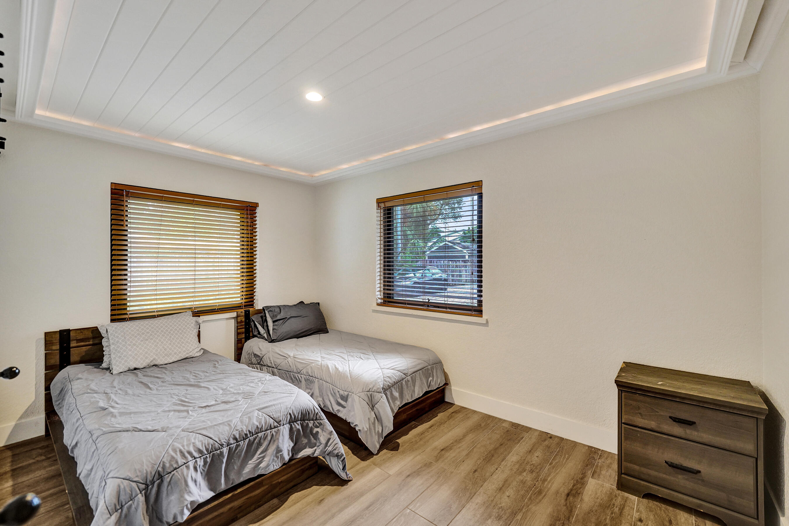 5612 Harding Street Hollywood, FL 33021 - Photo 23 of 52 a bedroom with a bed and a window