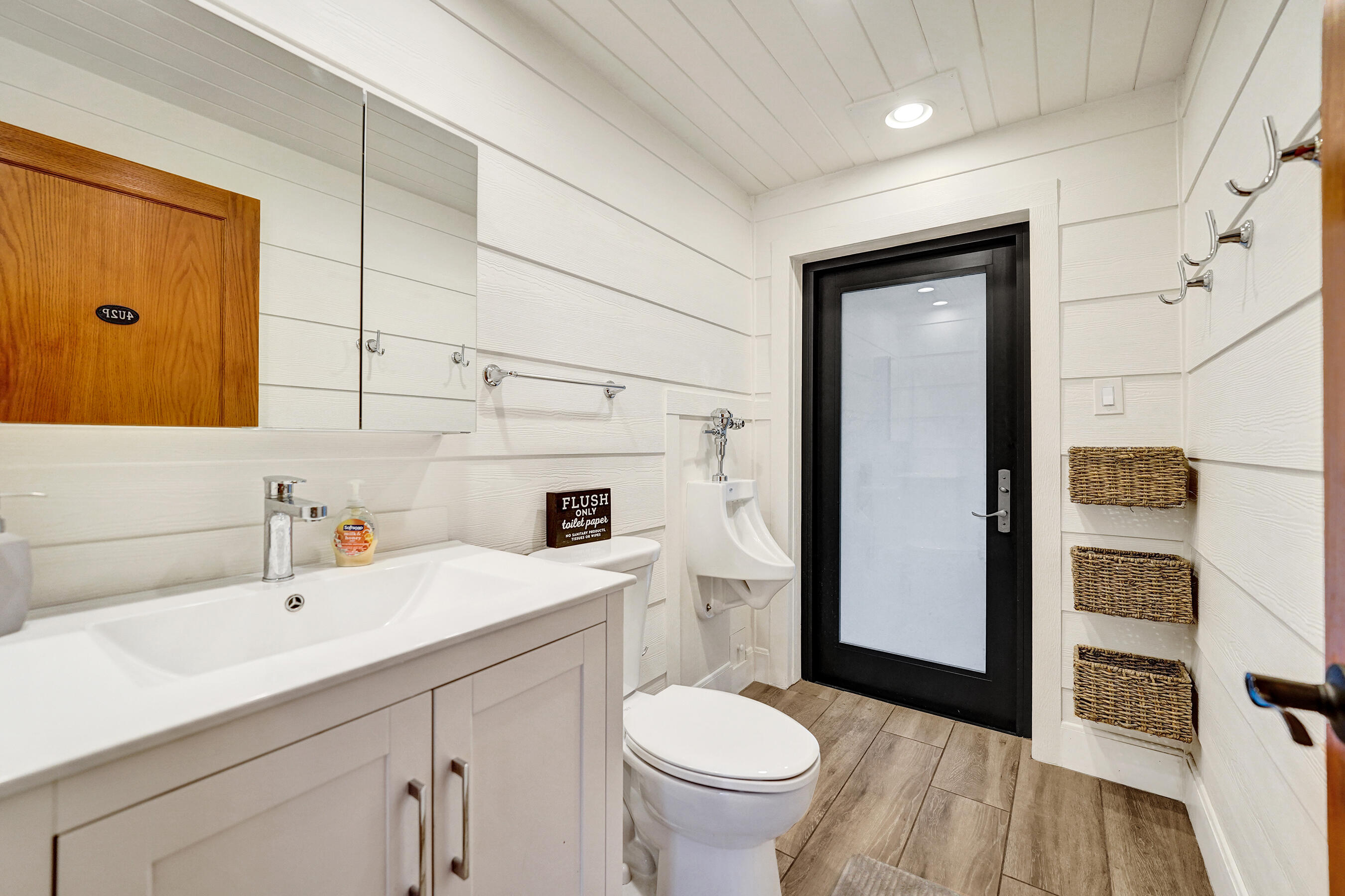 5612 Harding Street Hollywood, FL 33021 - Photo 24 of 52 a bathroom with a sink toilet and shower