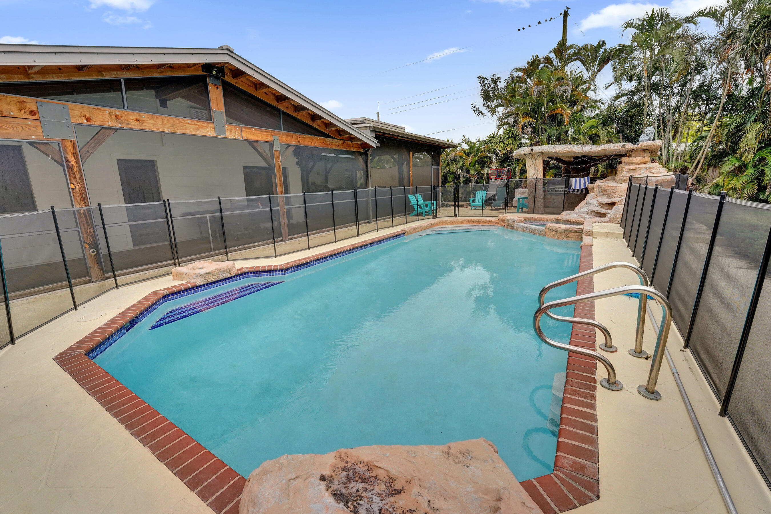 5612 Harding Street Hollywood, FL 33021 - Photo 27 of 52 a view of a backyard with sitting area