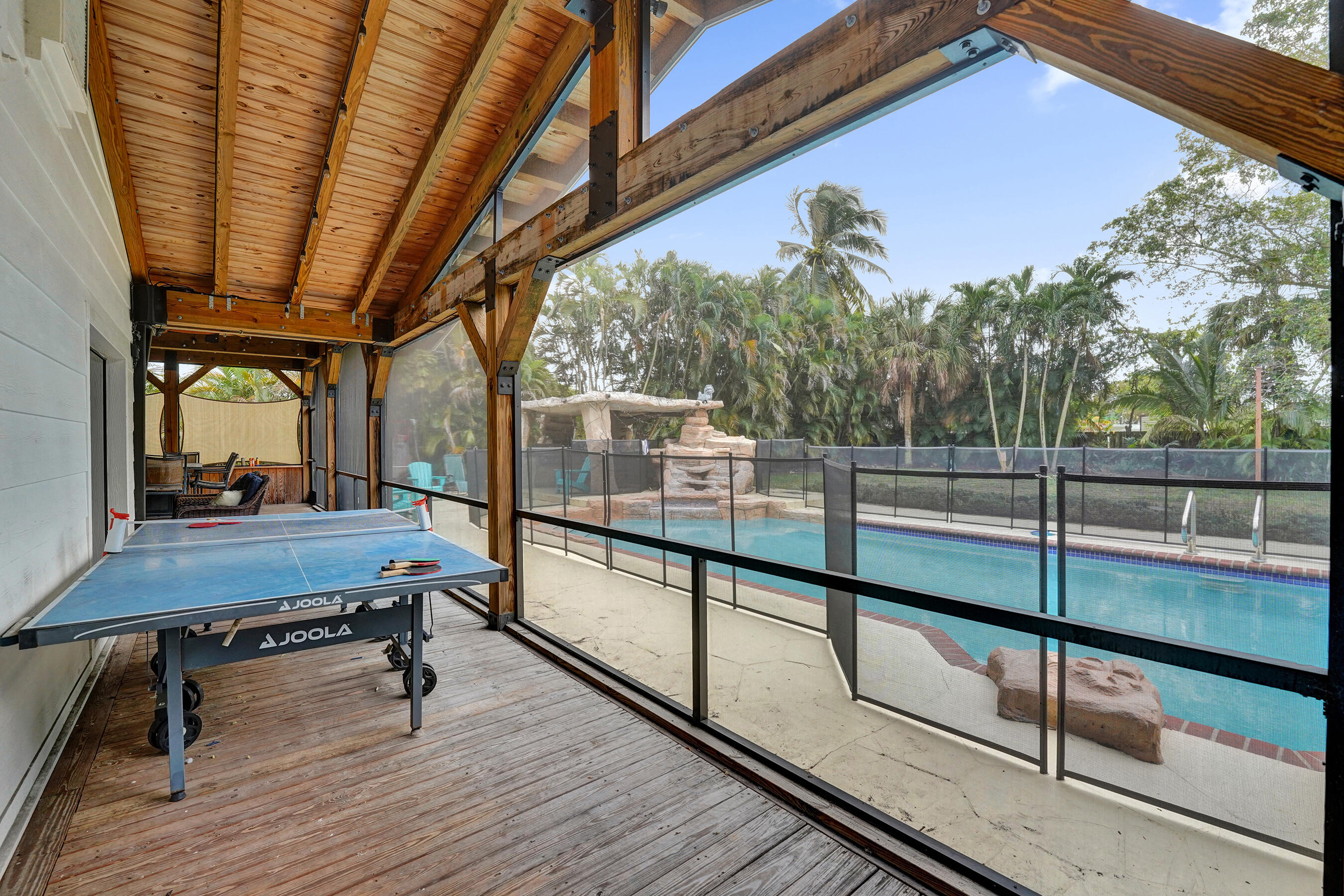 5612 Harding Street Hollywood, FL 33021 - Photo 30 of 52 a view of a room with wooden floor and wooden floor