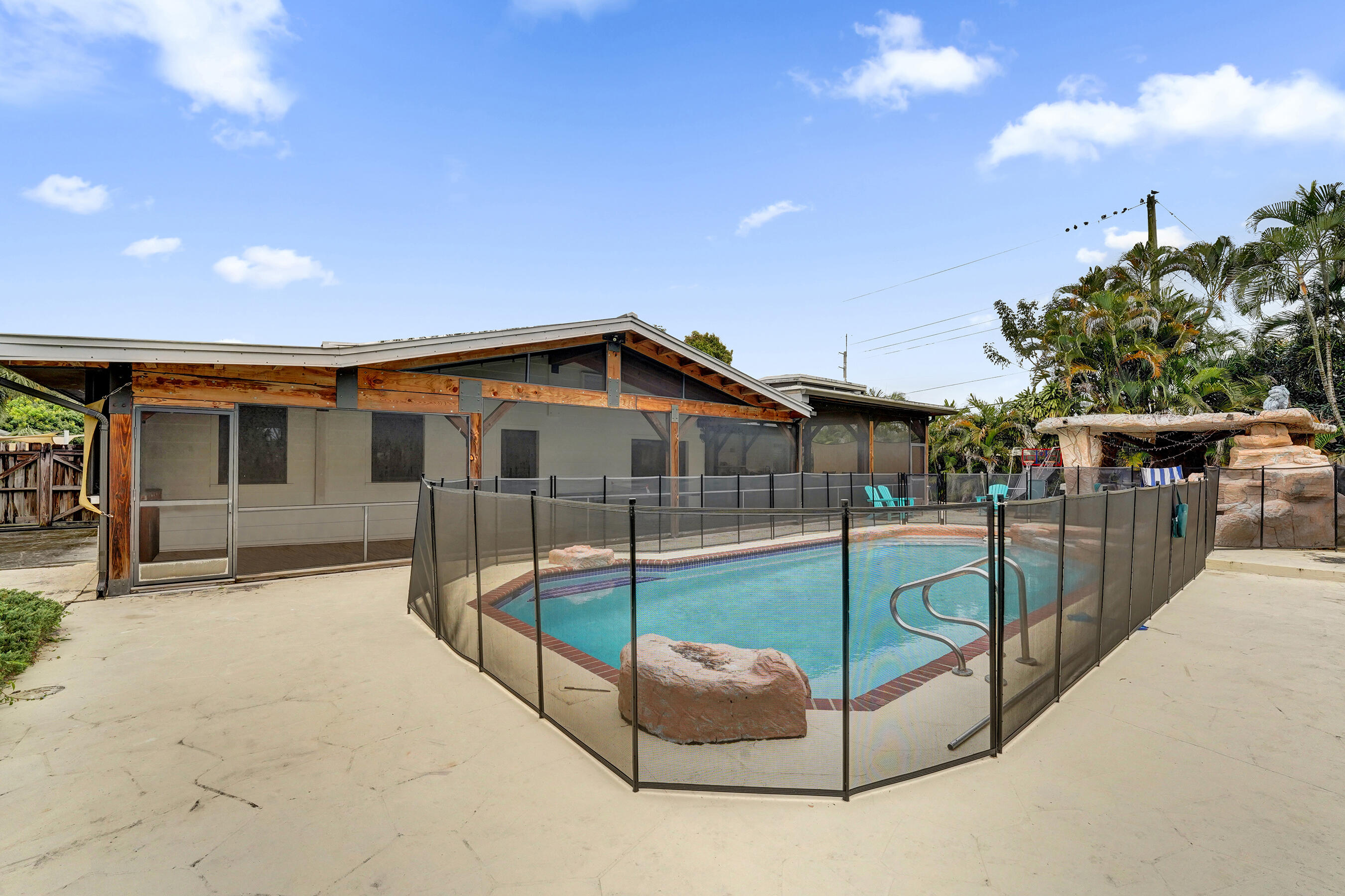 5612 Harding Street Hollywood, FL 33021 - Photo 33 of 52 a view of a house with backyard and sitting area