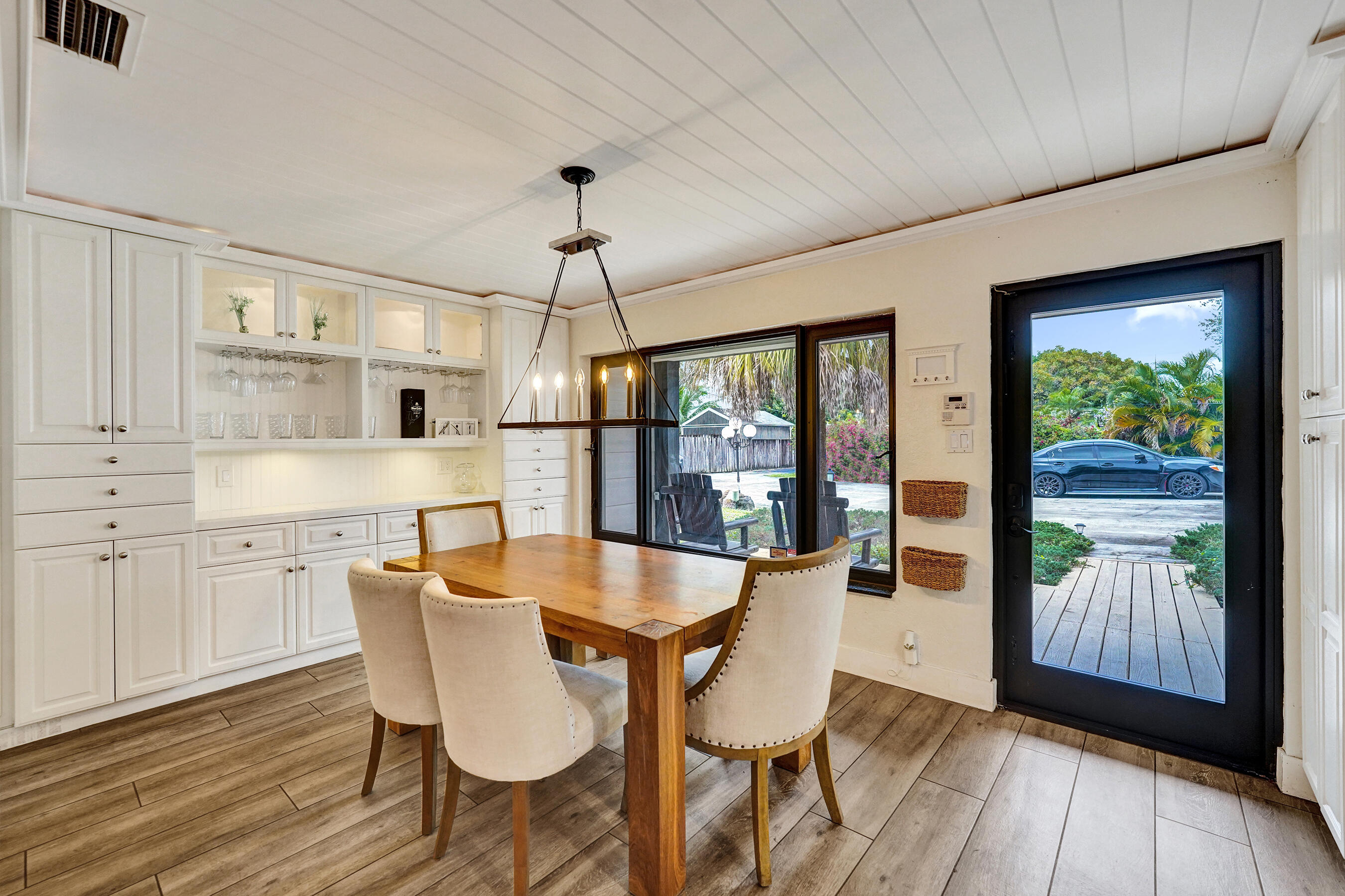 5612 Harding Street Hollywood, FL 33021 - Photo 4 of 52 a view of a dining room with furniture window and wooden floor