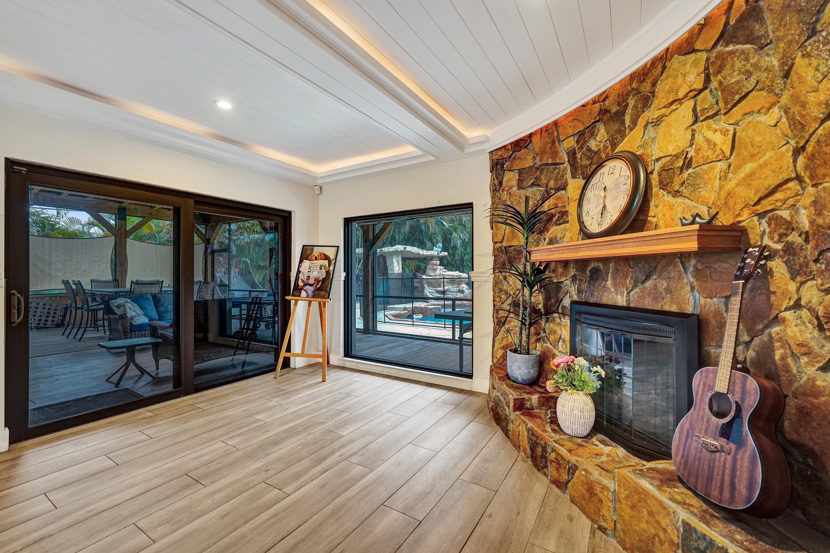5612 Harding Street Hollywood, FL 33021 - Photo 47 of 52 a front view of a fireplace with wooden floor