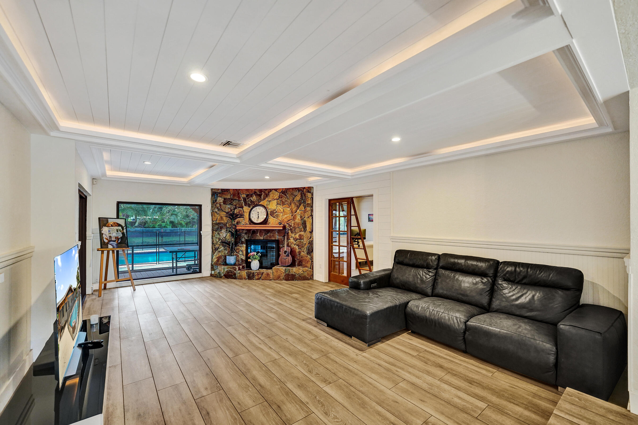 5612 Harding Street Hollywood, FL 33021 - Photo 9 of 52 a living room with furniture and a wooden floor