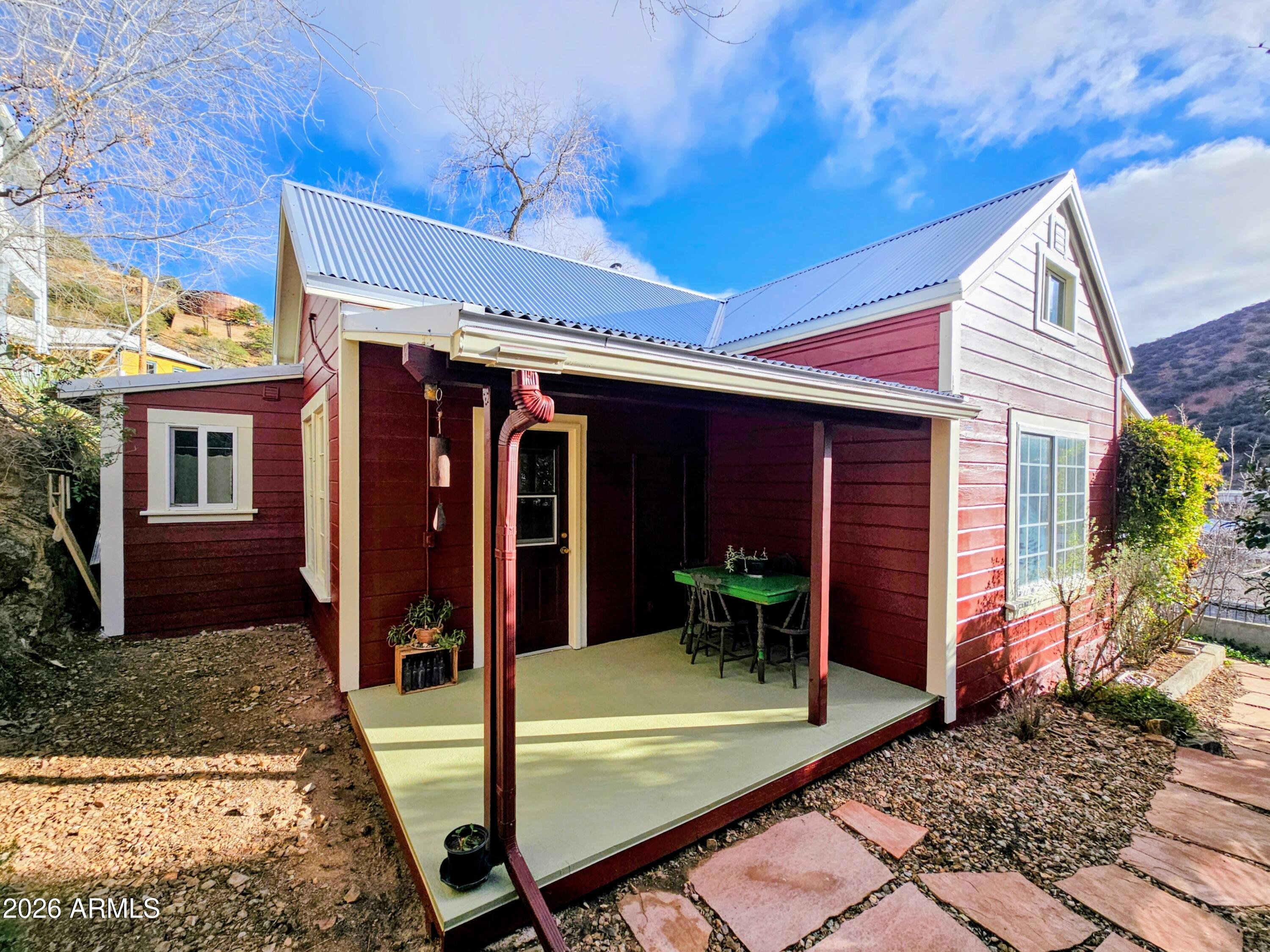 138 B Opera Drive Bisbee, AZ 85603 - Photo 3 of 34 front view of a house with a patio