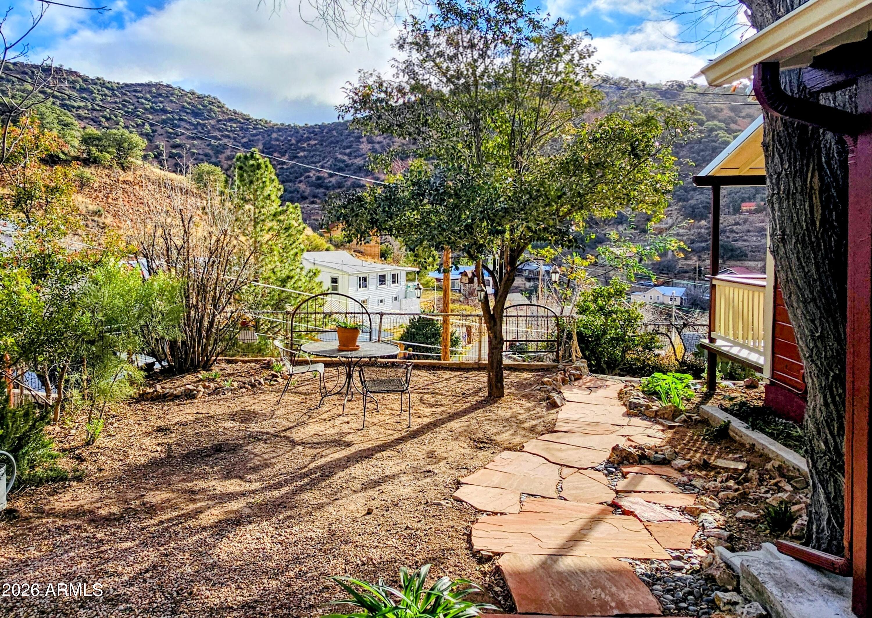 138 B Opera Drive Bisbee, AZ 85603 - Photo 33 of 34 a view of a bench in a backyard