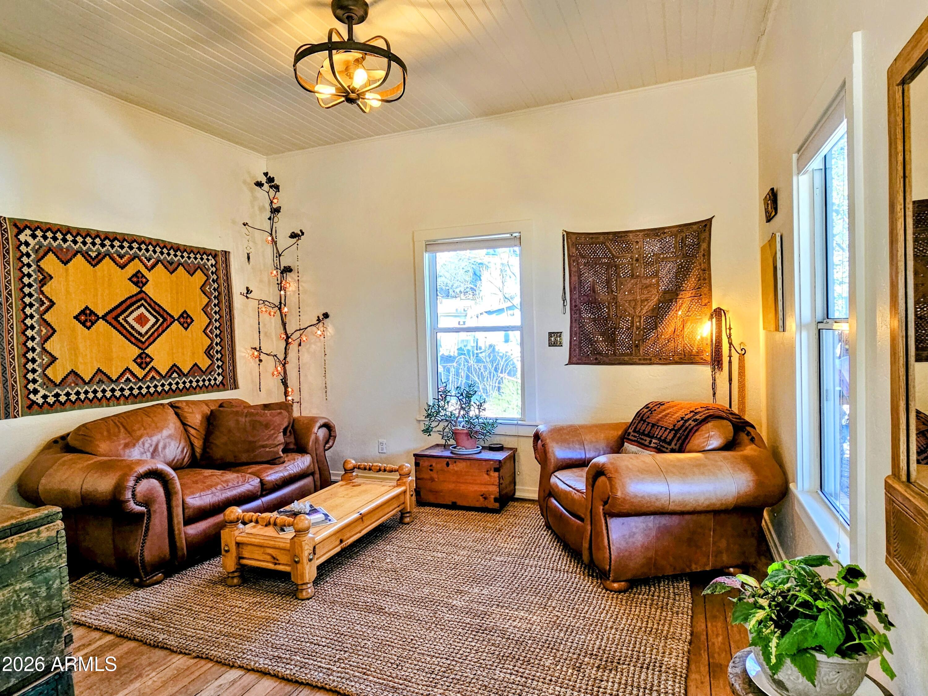 138 B Opera Drive Bisbee, AZ 85603 - Photo 9 of 34 a living room with furniture and a window