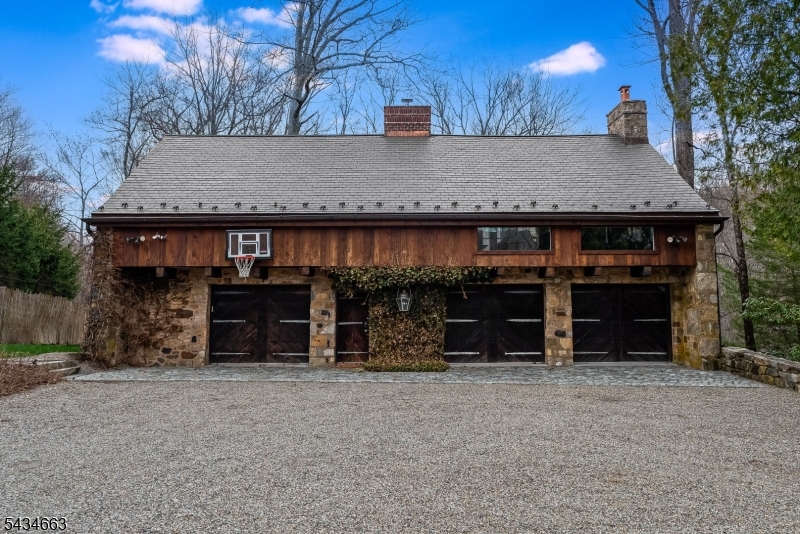 55 State Park Road Chester, NJ 07930 - Photo 44 of 48 a view of a house with a yard and garage