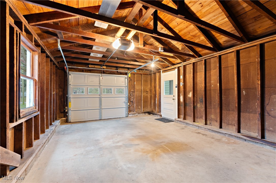 631 Killinger Road Clinton, OH 44216 - Photo 31 of 50 Garage featuring a garage door opener