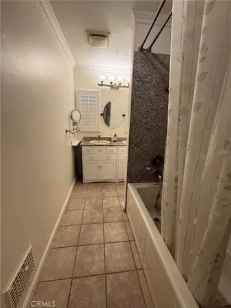 a bathroom with a bathtub sink and toilet