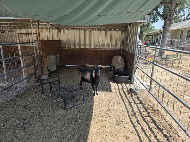 a balcony with table and chairs